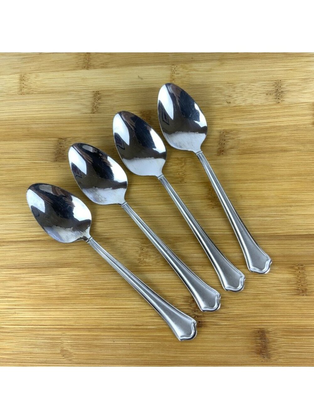 Capri Frost International Silver 18/10 Stainless Steel 4 Oval Soup Spoons